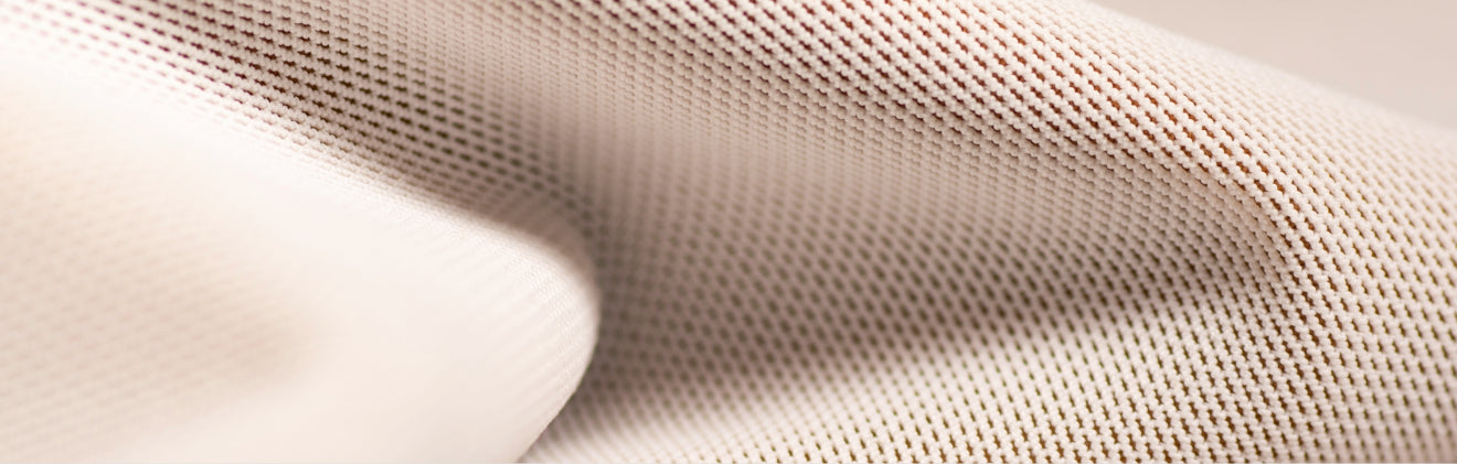 A close up of a mesh fabric