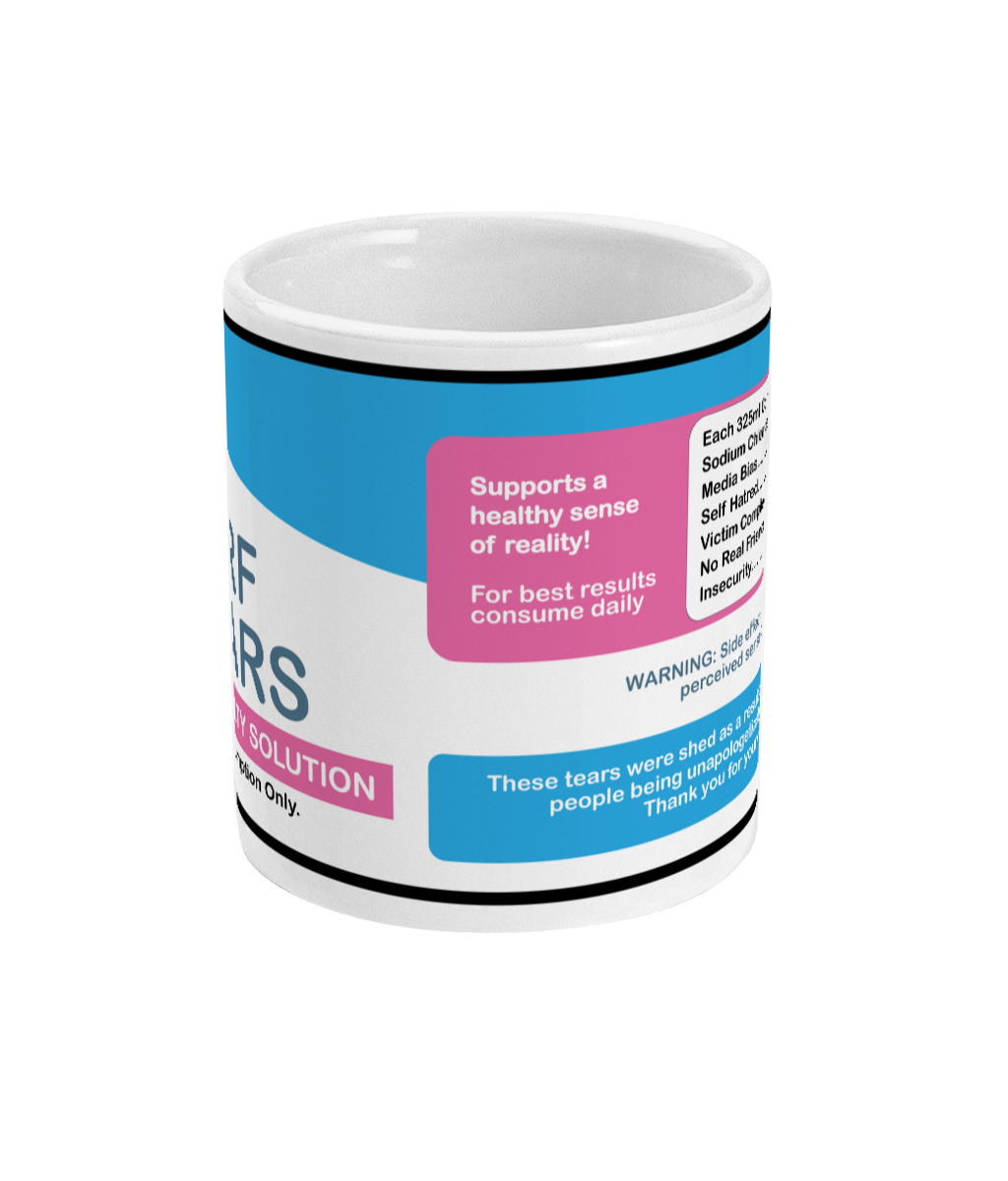 Mug with colorful text and medicine label style design on a white background