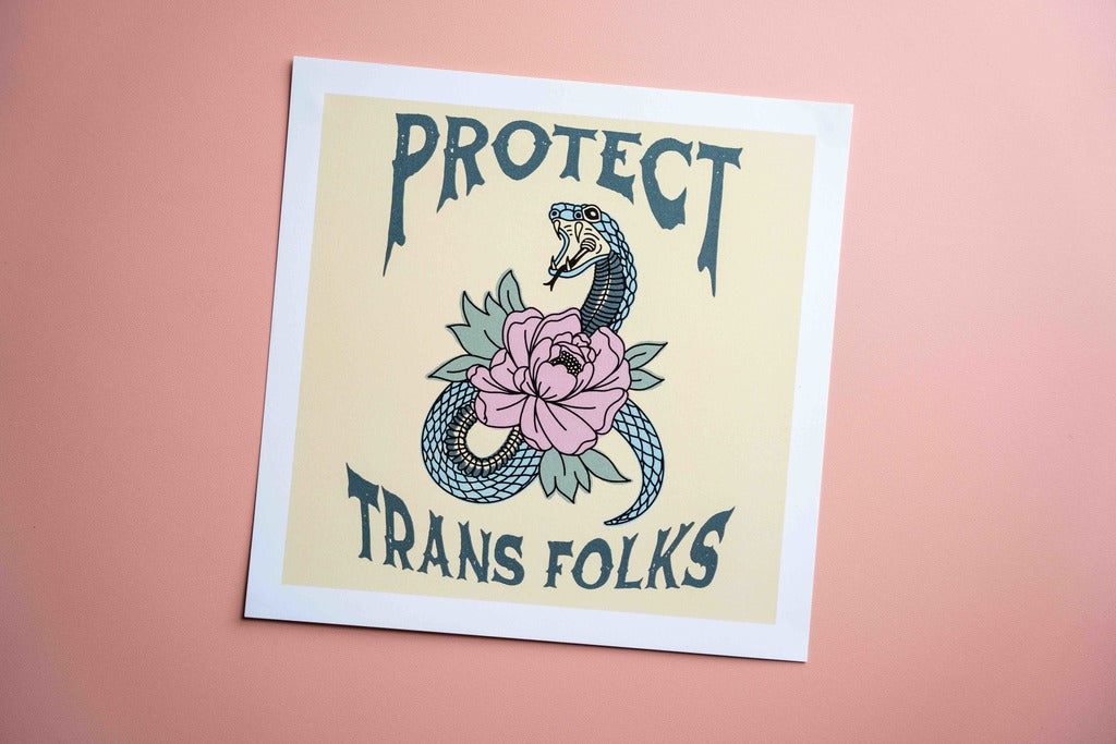 Square print with a snake and flower design and text 'PROTECT TRANS FOLKS' on a pink background